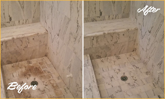 Before and After Picture of a Dirty Dowtown Brooklyn Marble Shower Cleaned to Eliminate Dark Stains